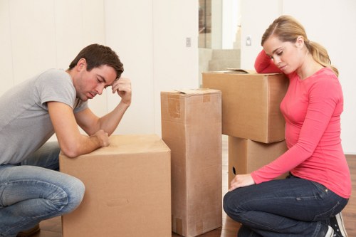 Organized moving supplies and planning documents for Canary Wharf relocation.